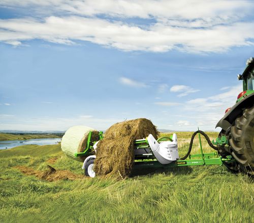 Прицепная машина для размотки тюков - Unrolla TE205 / Unrolla TX205 - Hustler Equipment - для кормов / для круглых кип / с цепью
