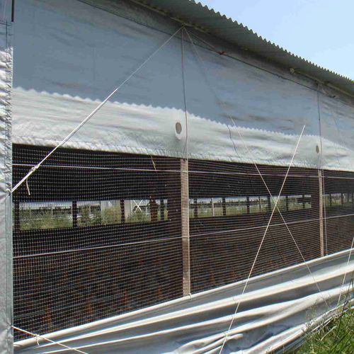 Ветрозащитный экран - Cortinas para galpones IVEGA - IVEGA-DOTEX S.A. - роллерная штора / боковой / механизированный